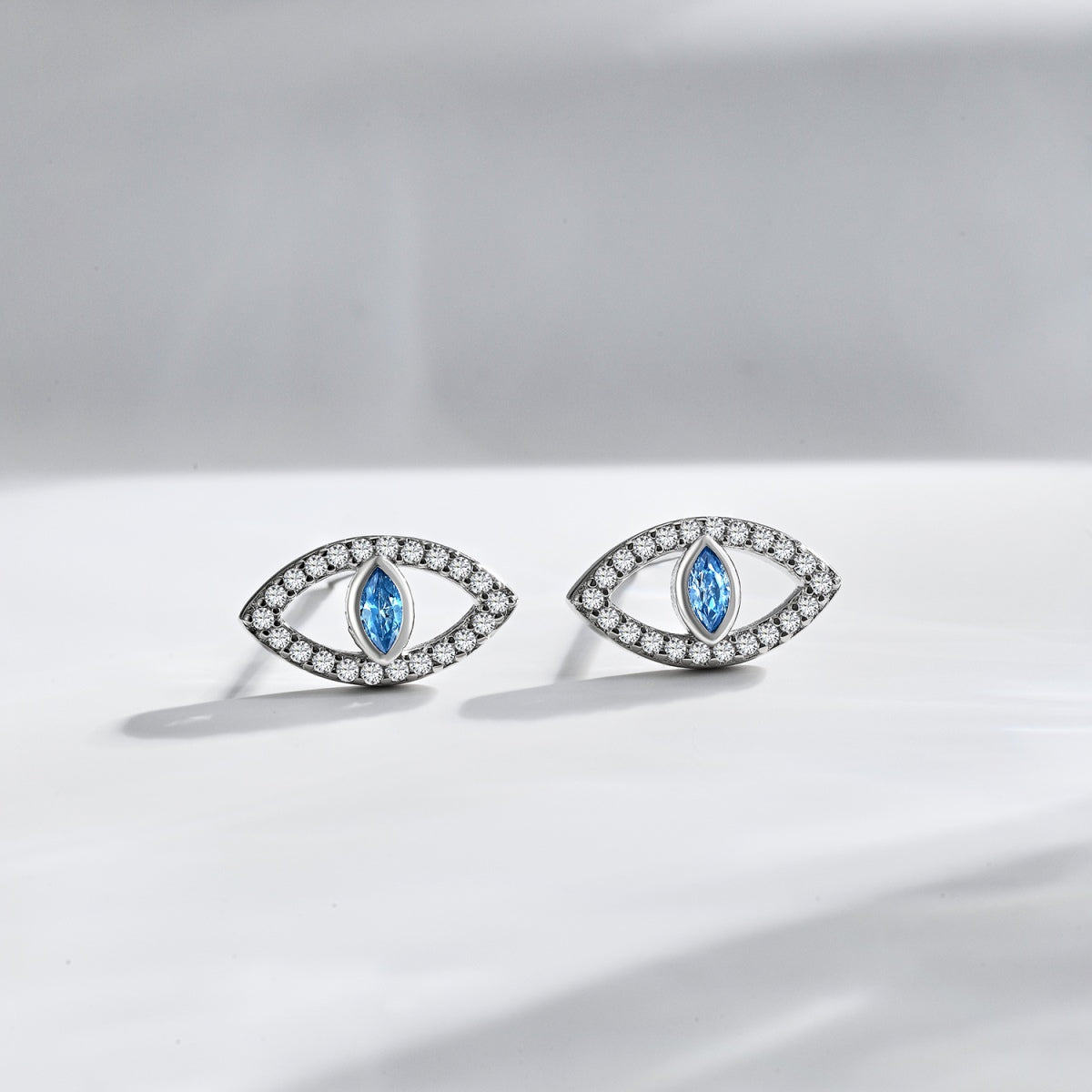 Pomuse Blue Devil Eyes Hollow Stud Earrings