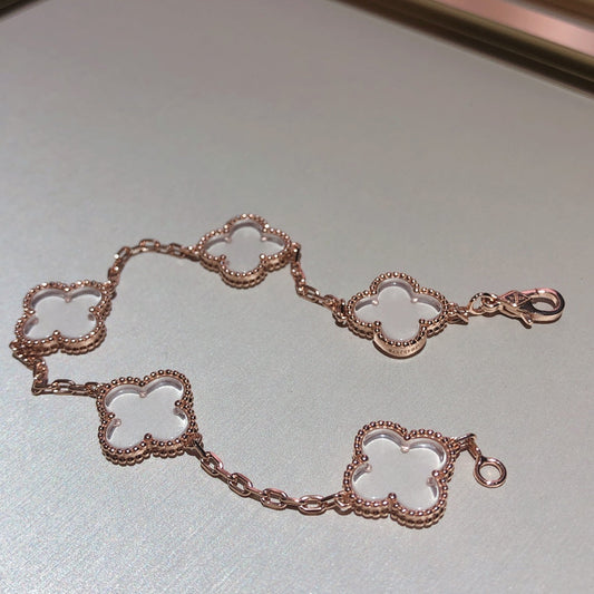 Pomuse Armband mit Kleeblattmotiv und 5 Bergkristallen in Roségold