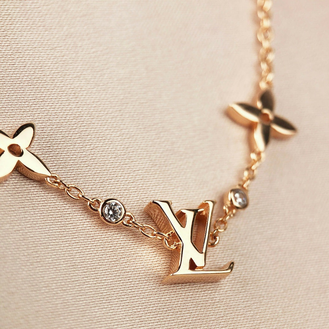 Pomuse STAR AND SUN 7 MOTIFS GOLD BRACELET