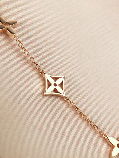 Pomuse STAR AND SUN 7 MOTIFS GOLD BRACELET