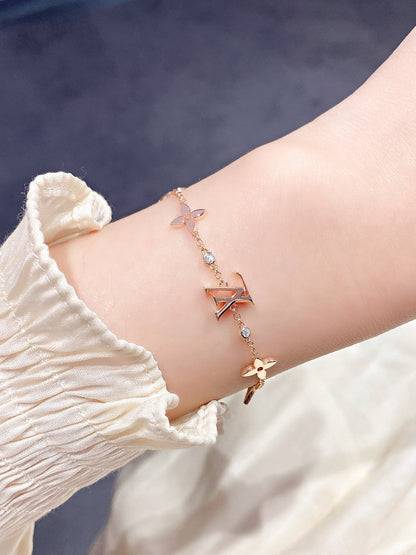 Pomuse STAR AND SUN 7 MOTIFS GOLD BRACELET