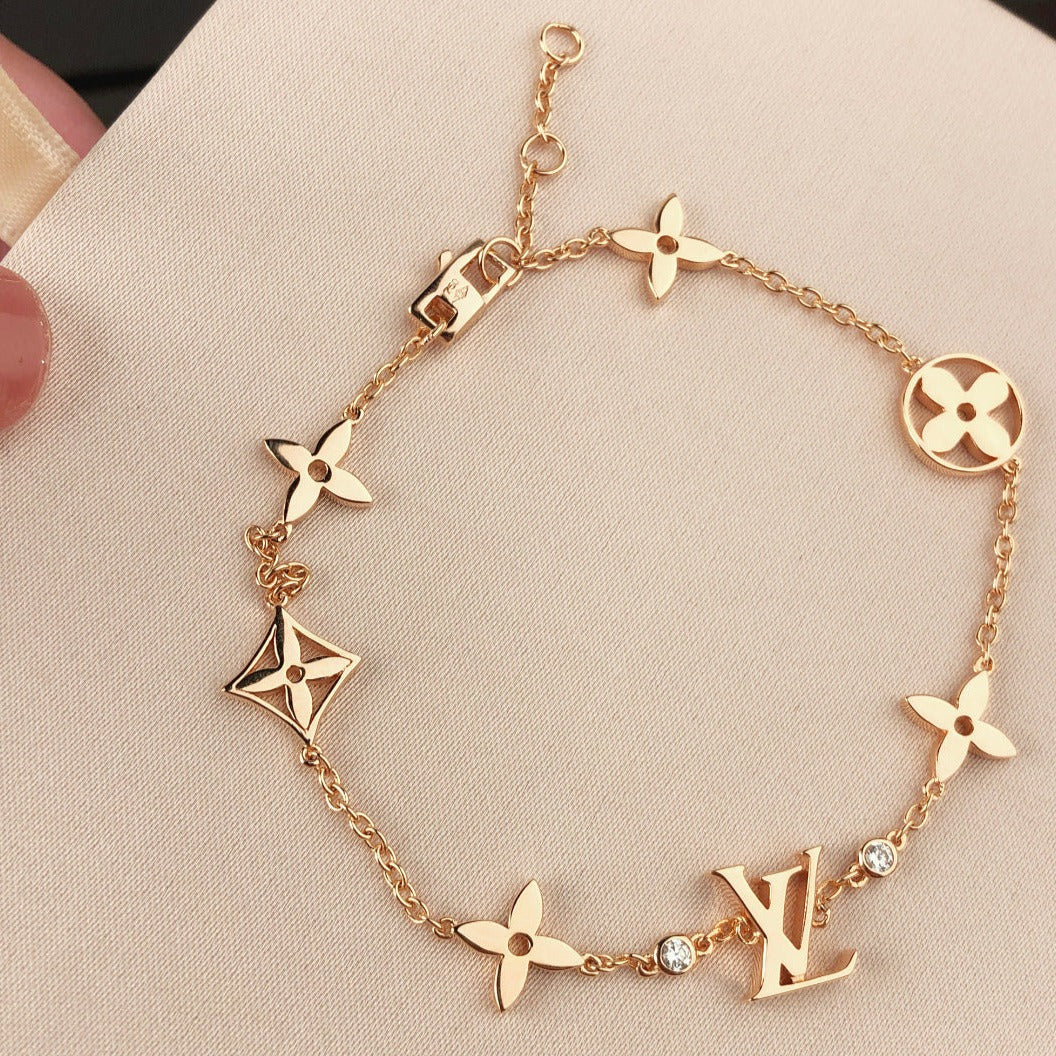 Pomuse STAR AND SUN 7 MOTIFS GOLD BRACELET