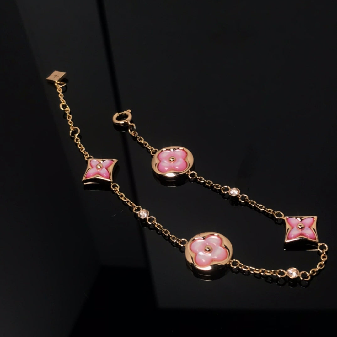 Pomuse STAR AND SUN 4 MOTIF PINK MOP PINK GOLD BRACELET