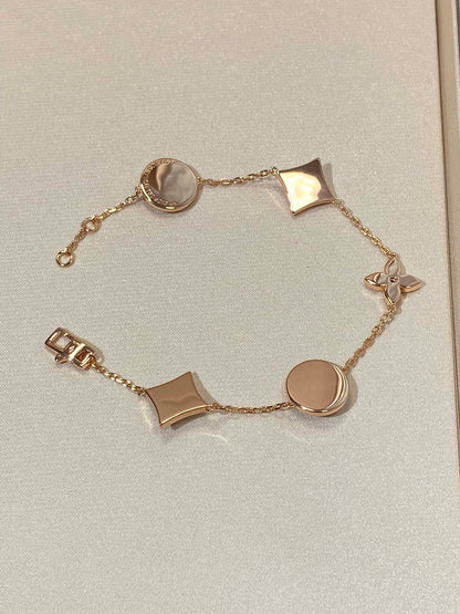 Pomuse STAR AND SUN 5 MOTIF MOP PINK GOLD BRACELET