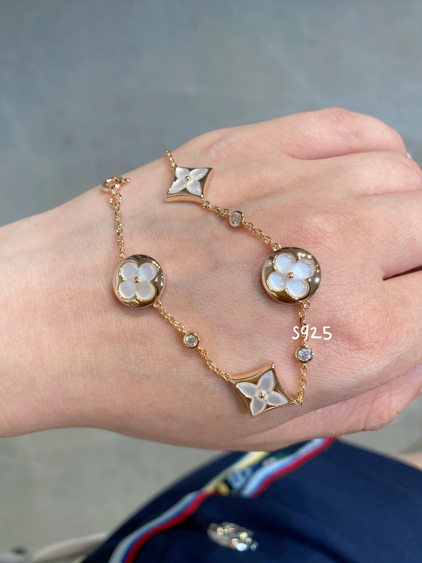 Pomuse STAR AND SUN 4 MOTIF WHITE MOP PINK GOLD BRACELET