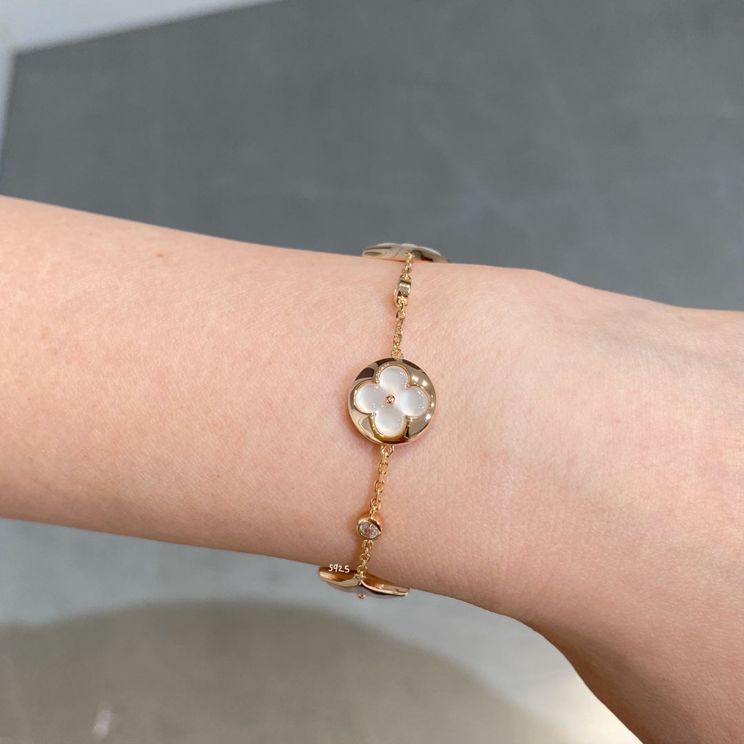 Pomuse STAR AND SUN 4 MOTIF WHITE MOP PINK GOLD BRACELET