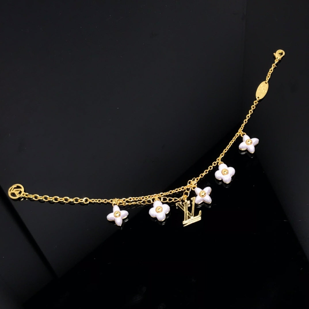 Pomuse LOGO 6 MOTIF STAR AND SUN GOLD BRACELET