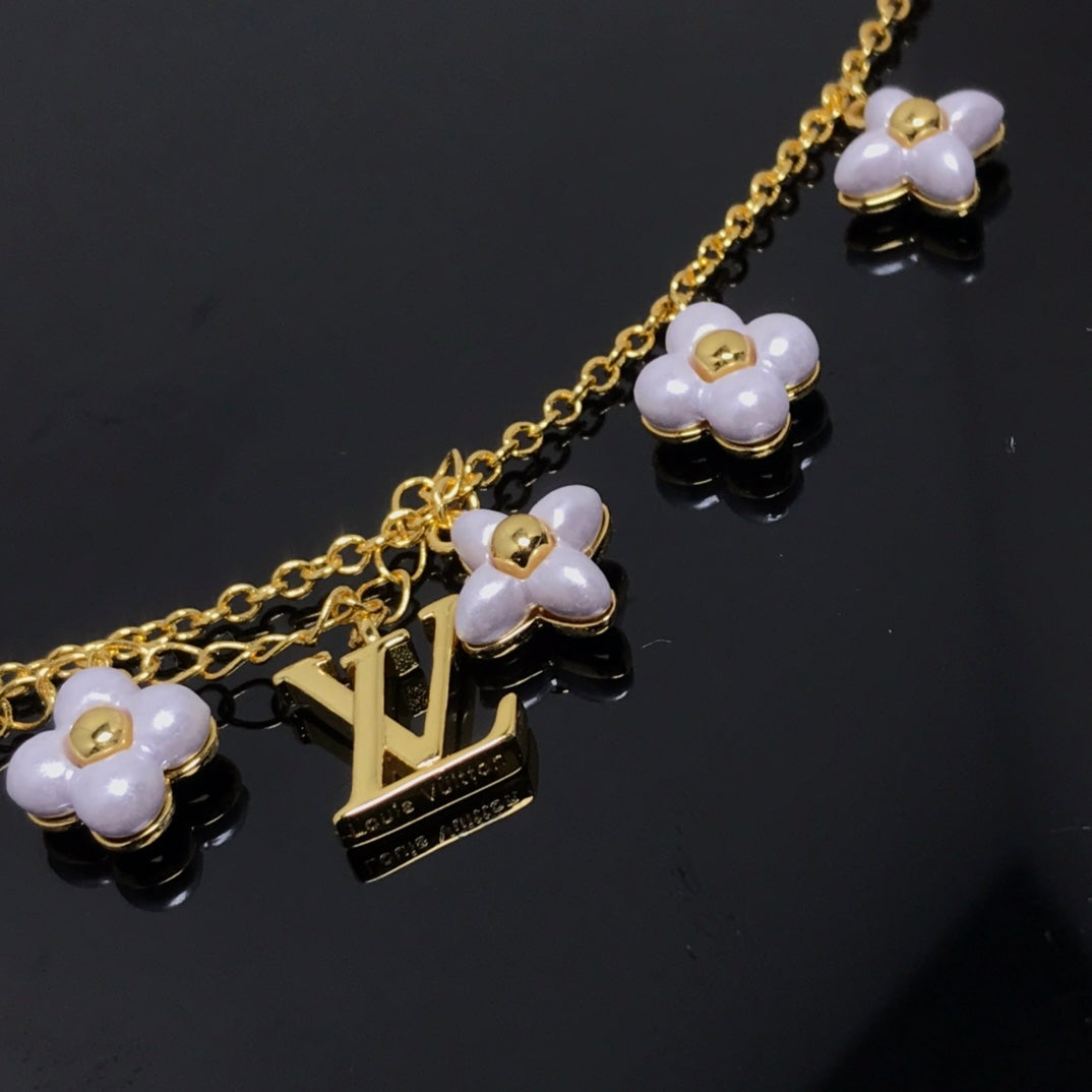 Pomuse LOGO 6 MOTIF STAR AND SUN GOLD BRACELET