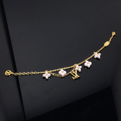 Pomuse LOGO 6 MOTIF STAR AND SUN GOLD BRACELET