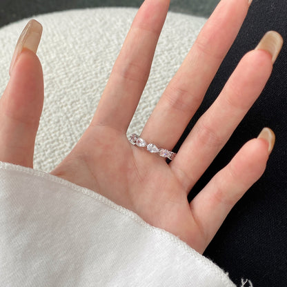 Pomuse – Exquisiter Tennisring mit Birnenschliff