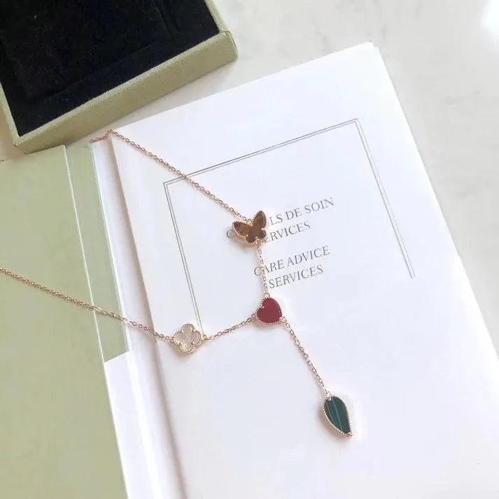 Pomuse LUCKY SPRING 4 MOTIFS ROSE GOLD NECKLACE