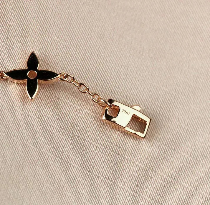 Pomuse STAR AND SUN 7 MOTIFS GOLD BRACELET