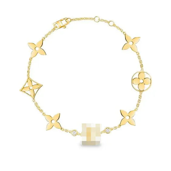 Pomuse STAR AND SUN 7 MOTIFS GOLD BRACELET