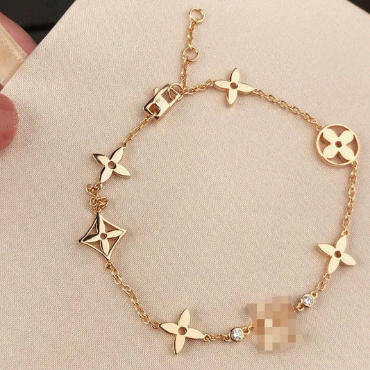 Pomuse STAR AND SUN 7 MOTIFS GOLD BRACELET