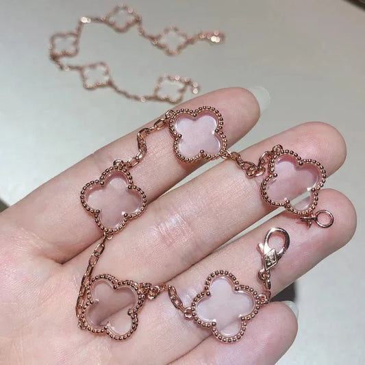 Pomuse Armband mit Kleeblattmotiv und 5 Bergkristallen in Roségold