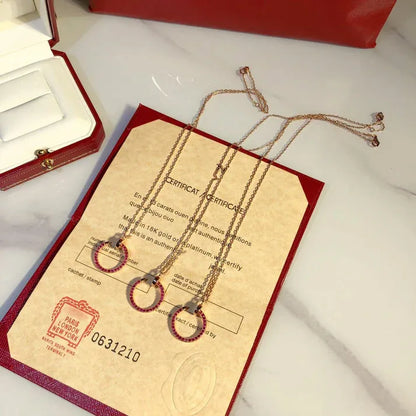 Pomuse JUSTE NECKLACE GOLD RED DIAMONDS