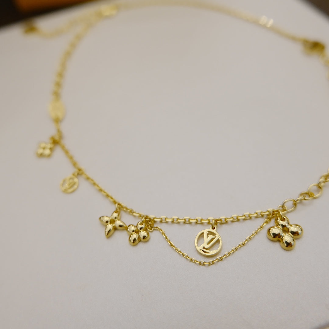 Pomuse BLOOMING SUPPLE NECKLACE BRASS