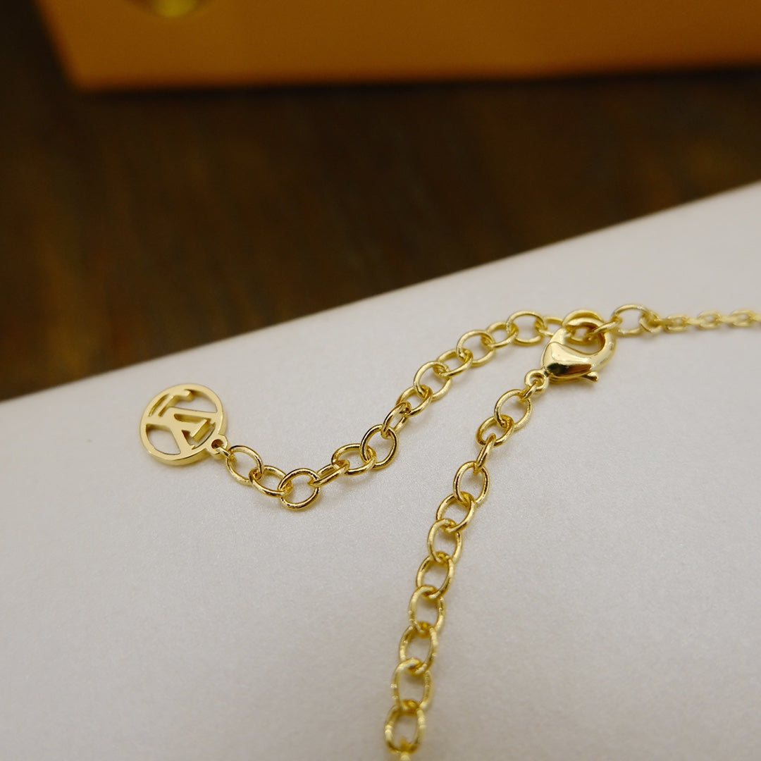 Pomuse BLOOMING SUPPLE NECKLACE BRASS