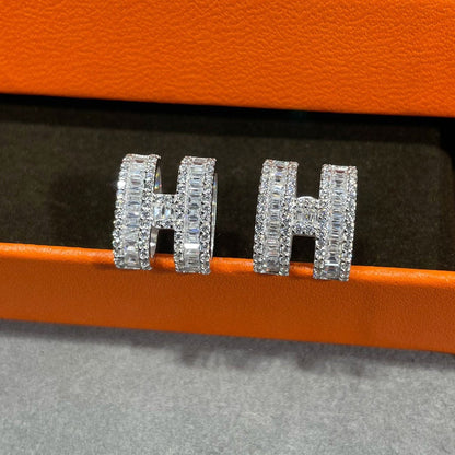 Pomuse H STUD EARRINGS WITH SILVER DIAMONDS
