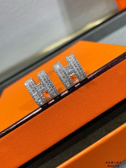 Pomuse H STUD EARRINGS WITH SILVER DIAMONDS